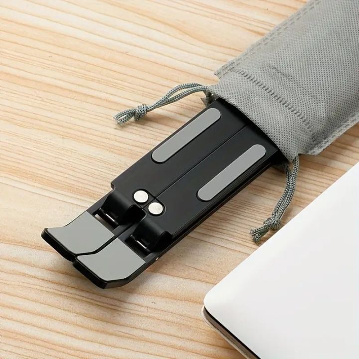 Metal%20Laptop%20Stand%20Portable%20Laptop%20Stand%207%20Gear%20Slot%20Anti%20Slip%20Silicone%20Foldable%20Adjustable%20Laptop%20Stand%20Compatible%20with%20all%20sizes%20of%20Laptop%20Easy%20to%20Carry%20Smart%20Stand%20Strong%20Material%20High%20Quality%20Stand%20Silver%20Color%20-%20Image%205