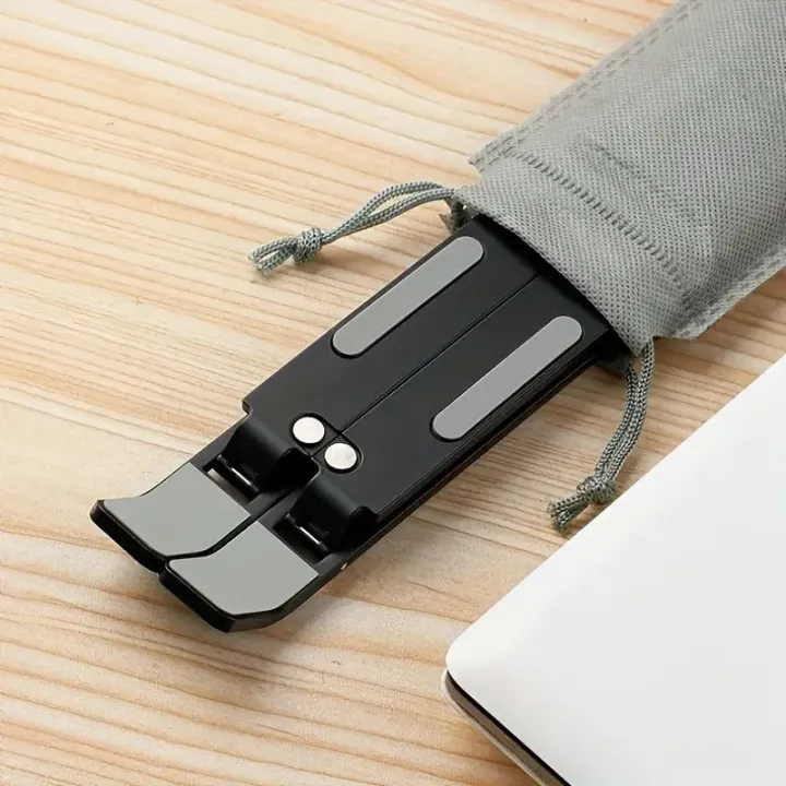 Metal%20Laptop%20Stand%20Portable%20Laptop%20Stand%207%20Gear%20Slot%20Anti%20Slip%20Silicone%20Foldable%20Adjustable%20Laptop%20Stand%20Compatible%20with%20all%20sizes%20of%20Laptop%20Easy%20to%20Carry%20Smart%20Stand%20Strong%20Material%20High%20Quality%20Stand%20Silver%20Color%20-%20Image%205