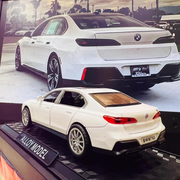Luxury%20BMW%207%20Series%20Diecast%20Model%20Car%20%E2%80%93%201:28%20Scale%20Alloy%20Metal%20Toy,%20White%20Sedan%20Collectible,%20Pull%20Back%20Action,%20Detailed%20Interior%20&%20Exterior,%20Kids%20&%20Adults%20Gift%20-%20Image%204