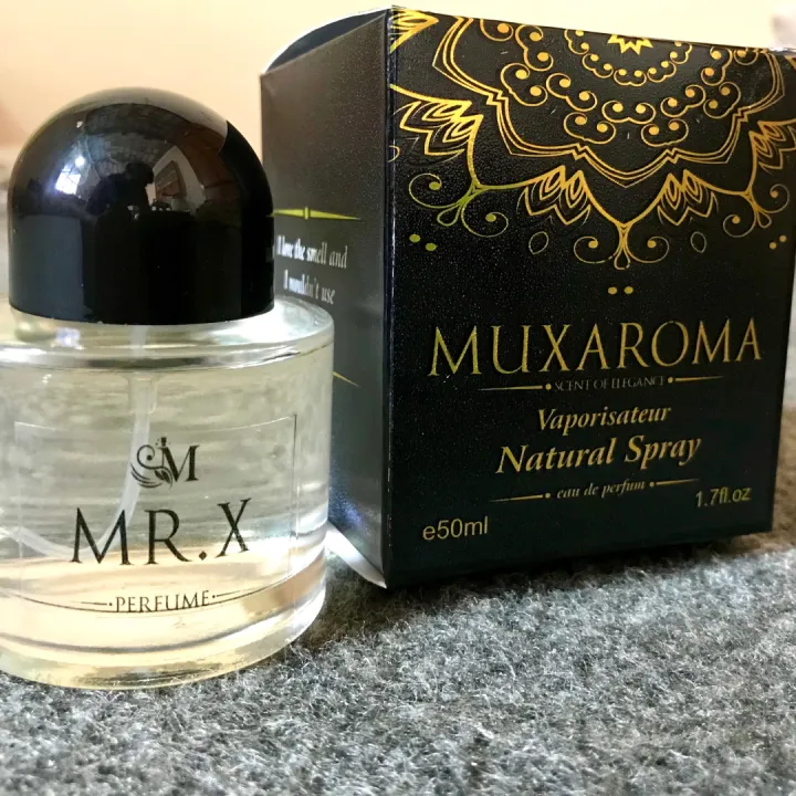 Muxaroma%20MR.X%2050ml%20Perfume%20%E2%80%93%20A%20Mysterious%20and%20Bold%20Fragrance%20for%20the%20Confident%20Individual.%20A%20captivating%20scent%20designed%20for%20those%20who%20thrive%20on%20intrigue%20and%20charisma.%20This%20bold%20and%20alluring%20fragrance%20blends%20fresh,%20spicy,%20and%20woody%20notes.%20-%20Image%204