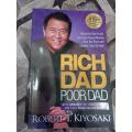 RICH  DAD poor dad by Robert t, kiyosaki. 