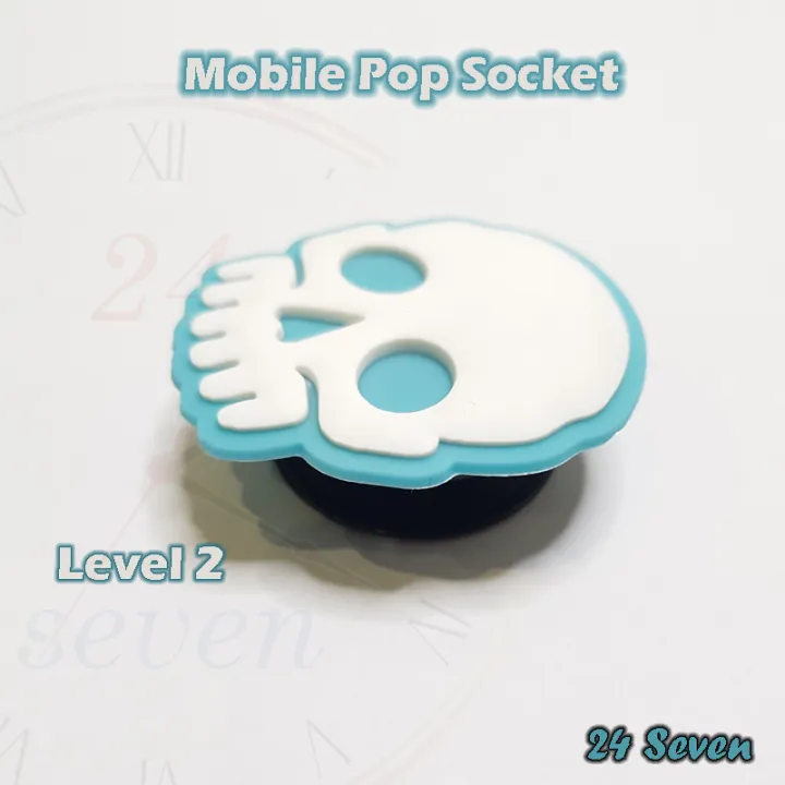 Universal%20Pop%20Socket%20For%20Mobiles%20/%20Tablets%20with%20Pop%20Clip%20(Bracket)%20-%20Skull%20and%20Paw%20-%20Cyan%20and%20Pink%20-%20Image%206