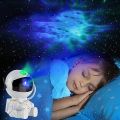 Astronaut Galaxy Star Projector Lamp - Rotating Starry Sky Night Light for Kids' Room. 