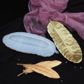 Resin silicone feather molds for jewelry making tray trontray dish holders. 