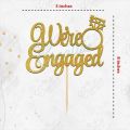 We're Engaged Cake Topper for Cake Decoration, Wedding Anniversary & Engagement Party Celebration Toppers in Gold. 