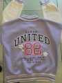 Purple Girls Varsity/basketball jacket for girls. 