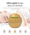 Ultrasonic Mini Aroma Humidifier ( 7 Color Changing LED Lights ). 