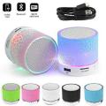 MP3 Player Wireless Mini Bluetooth Speaker with Rechargeable Battery, LED Light, SD Card, FM Radio, USB Support, Multi-Color Options. 