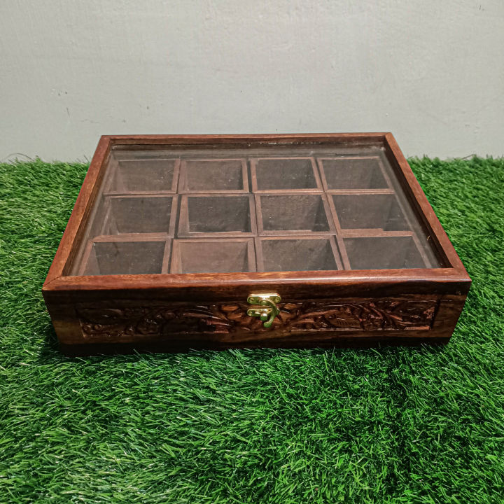 Spice%20Container%20(%20Masala%20Box%20)%20Made%20of%20Pure%20Rose%20Wood%20with%20Hand%20Carving%20Having%2012%20removable%20boxes%20with%20capacity%20of%20over%20100%20Gram%20(Powder%20Spices)%C2%A0with%C2%A0Glass%C2%A0Lid%20and%20one%20Spoon%20-%20Image%205
