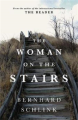 The Woman On the Stairs By bernhard schlink. 