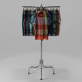 Rotating Boutique Display Stand Metal Clothes Rack for Hanging Shirts, Dresses, and Coats Ideal for Fashion Stores, Exhibitions, and Retail Outlets.. 