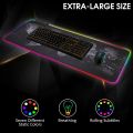 RGB gaming keyboard and  Mouse is a full mechanical model with blue switches, featuring a sleek white design and a Type-C connection The RGB gaming mouse pad is waterproof, easy to clean, and comes in a large size of 800x300mm, 3 in 1 Combo for Gamers. 