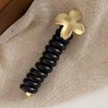 Simple Yet Stylish Rubber Band For Women's Hair Unique Headwear For Bubble Braid Hairstyles Statement-making Hair Accessory With Embedded Gems Elegant Ponytail Phone Line Headwear Luxurious Headband With Intricate Jewelry Details. 