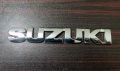 Pack of 2 Suzuki Mehran Plastic Chrome Trunk Monogram Emblem. 