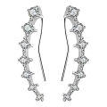 A Row Of 7 Crystal Stud Earrings For Girls - Pair. 