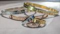 "Gold and Silver Plated Bracelet and Ring Combo - Designer Style". 