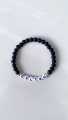Customize your Name on bracelet with black color beads. 