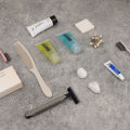 Hotel disposable toiletry set, carton cardboard, card, box, disposable toothbrush, shampoo, toothbrush, comb, hotel supplies. 