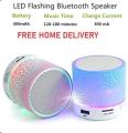 Mini Portable Bluetooth & Rechargeable Speaker with Light + SD Card + USB Supported Multi Color. 