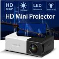 Mini Projector - YG300 Mini LED Projector - Portable Pico Full Color LED LCD Video Projector. 