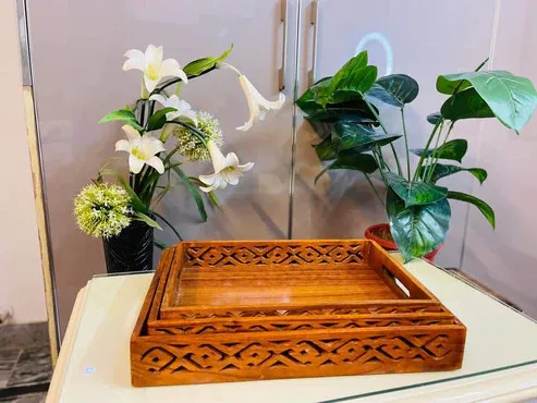 Intricate%20Cutwork%20Design:%20Handcrafted%20Pakistani%20Wooden%20Serving%20Tray%20%7C%20Decorative%20Platter%20for%20Dining%20Table,%20Kitchen,%20Breakfast%20Tray%20%7C%20Hadi%20Wood%20Crafts%20%7C%20Decorative%20Platter%20for%20Dining%20Table,%20Kitchen,%20or%20Living%20Room%20%7C%20Pakistani%20Tray%20%7C%20Tea%20Serving%20Tray%20-%20Image%203