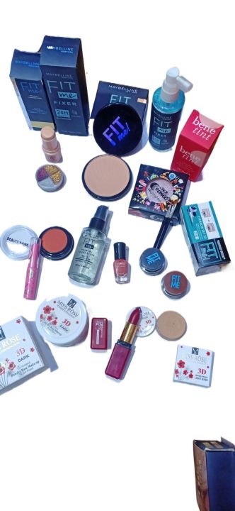 14 in 1 makeup deal. fixer, Pink magic, Cool Betty concealer stick, Romantic may lipstick, loose powder, primer, face powder, Beauty bank blush on, Cosmee highlighter, 4in1 glitter,base, Nail paint, 2in1 gel liner