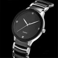 Online Sale Black Stainless Steel Crystal Wrist Watch Simple Quartz Watch Men Women. 