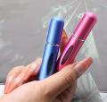 Refillable Perfume Atomizer - 5ml Travel Size, Mini Spray Bottle, Portable Refillable Empty Metal Bottle for Fragrance, Travel Essential, Leak-Proof, Pocket-Sized, Ideal for Men & Women. 