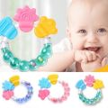 Rattle Shape Silicone Baby Teether - Safe, Non-Toxic, BPA-Free, Soft and Durable Teething Toy for Infants – Perfect for Soothing Sore Gums and Promoting Oral Health. 
