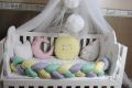 baby cot  3 feet braid one flat sheet pillow  3 cushions one canopy with pom pom and ring and 2 large clouds. 