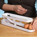 Egg Holder for Fridge, Egg Dispenser, Automatic Rolling Egg Container, 2-Tier Egg Dispenser, Space Saving Egg Tray for Refrigerator, Egg Holder, Refrigerator, Rolldown Egg Dispenser Auto Rolling Egg Holder Storage Rack. 