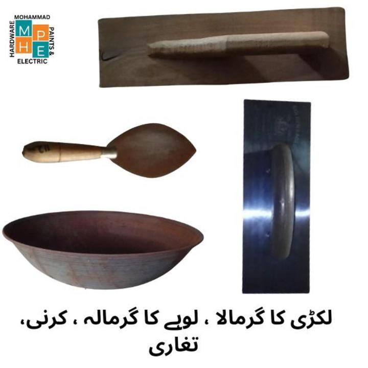 Tools for mason ۔ Mortor Mixing trough (تغاری ), hand trowel (wooden) for plaster leveling (لکڑی کا گرمالا), hand trowel (metal) for plaster leveling (لوہے کا گرمالا), cement & mortor mixing trowel (کرنی)