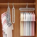 Magic Hanger - 9 hole closet organizer - space saving magic plastic hangers - organizer 9 hole hangers for clothes paints trousers shirt hanger 9 in 1 hangers - Multi Purpose Hanger - Clothes Plastic Hanger - High Quality Hanger. 