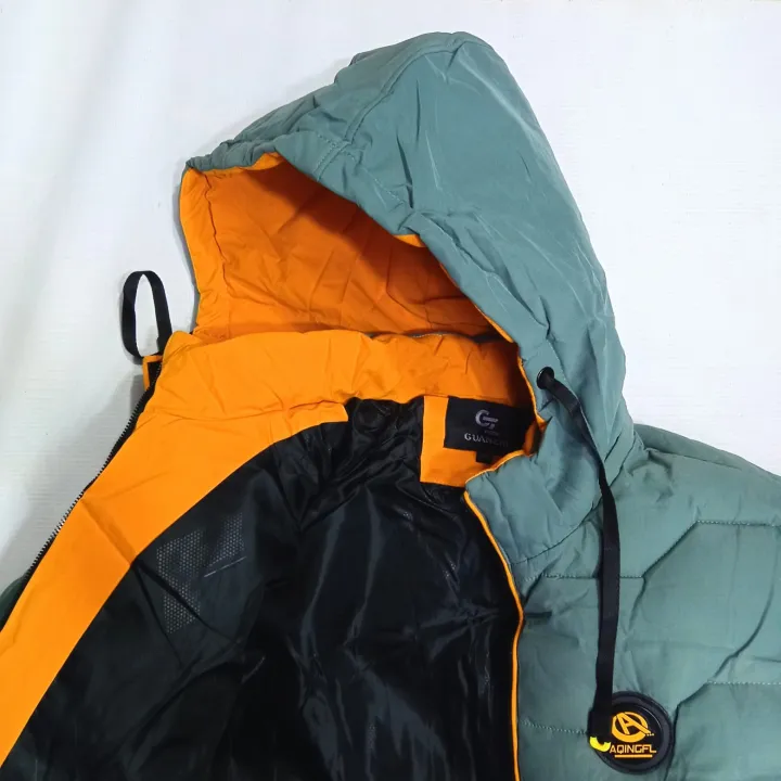 Trendy%20Parachute%20Puffer%20Jacket%20for%20Men%20And%20Women%20%7C%20Synthetic%20Insulation%20Puffer%20Suitable%20for%20Extreme%20Cold%20Weather%20with%20Removable%20Hood%20and%20Ribbed%20Cuffs%20-%20Image%207