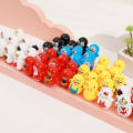 Cute little tumbling toys-12 pieces. 
