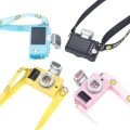 Head dog smiley strap webbing luminous sound camera pendant simulation doll mini camera backpack. 
