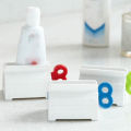 Pack of 4 Plastic Rotary Toothpaste Squeezer Device - Durable Rolling Tube Paste Squeezer & Dispenser - Manual Rotary Paste Holder. 