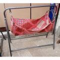 Color Coated Small Bearing Folding Baby Cradle with Free Sleeping Cloth. 