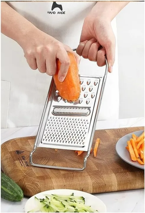 Stainless%20Steel%20Grater%20with%20Storage%7C%20vegetable%20peeler%20steel%20grater%7C%20hole%20hand-held%20cheese%20grater%7C%20%20best%20for%20cheese%7C%20fruits%20and%20vegetables%203%20in%201%7C3%20Function%20Stainless%20Steel%20Grater%7C%20Slicer,%20Ginger,%20Cucumber,%20Carrot,%20Cheese%7C%20-%20Image%205