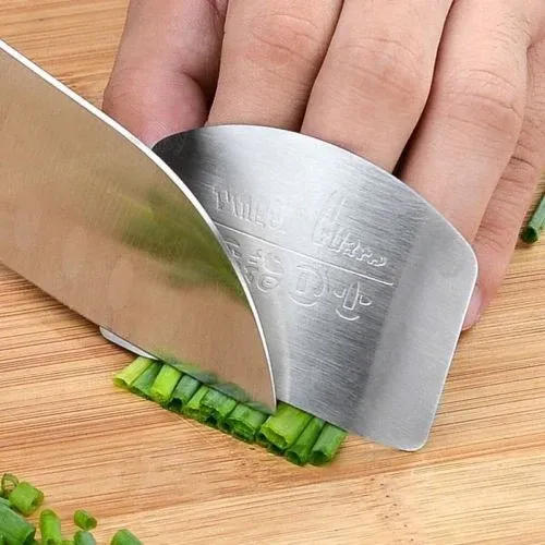 Online%20Karachi%20Stainless%20Steel%20Finger%20Guard/Stainless%20Steel%20Finger%20Guards%20Shield%20Shape%20Design%20Multi-Function%20Cutting%20Vegetables%20Hand%20Guards%20Finger%20Protector%20Guards%20-%20Image%203