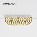 IHOMCASA Modern Simple Concealed Handle Brass Leaf Invisible Pulls Wardrobe Cupboard Cabinet Furniture Drawer Golden Knobs. 