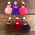cute keychain baby doll fluffy keychain feather fluff baby doll cute keyhains for gift by Ataya. 