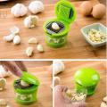 Garlic Press, Chopper, and Storage Container, Includes Silicone Garlic Peeler, Easy to Clean, Stainless Steel Blades, Green. 