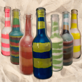 Handcrafted Multicolored Glass Bottle Sand Art - Unique Home Decor Accent. 