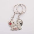 Magnetic Keychain 1Pair Couple Keychain Cartoon Bride/Bridegroom Kiss Key Ring Lovers Love Key Chain Souvenirs Couple gift Valentine's Day Gift. 