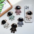 Universal Cute Cartoon 3D Astronaut Phone Holder, Portable Hidden Phone Stand, Smartphone Foldable Lazy Bracket. 