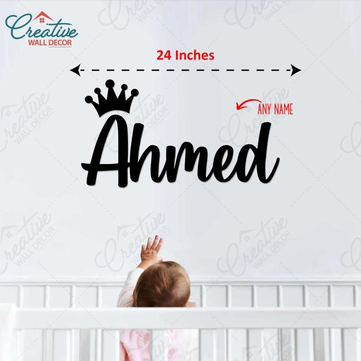 Personalized nursery name sign mounted on wall