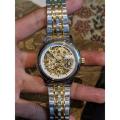Skeleton Watch 10 Year Brand Warranty Automatic New Model Water Proof Beautiful Golden Mechanic Two tone Chain Sports Watch 100% Original 10 year warranty. 