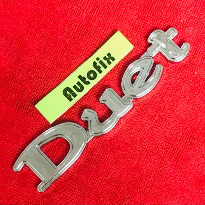 Toyota duet Rear plastic emblem Silver Color 01 pc