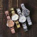 Fopul Mall Luxury Women's Wristwatch Set - Simple Dial and Hollow Strap Fashion, Gold Bracelet and Quartz Watch 2pcs Set. 